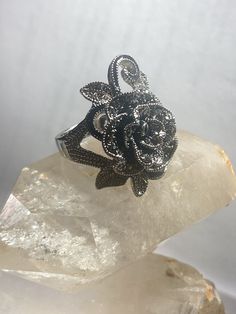 "Rose ring floral band sterling silver women Size 7.50 Between a size 7.50 and a size 7.75 Weight 9.3g Length 1 1/8\" Width 3/4\" thinnest part 1/8\" Free Shipping & Free Postal Insurance Delivered in a Gift Box If you do not want the ring polished and want to leave the natural patina please let me know at the time of purchase as I do polish rings before I ship rings out. Thanks Free First Class shipping and postal insurance is included. If you want to upgrade to priority kindly pay an addit Silver Wedding Jewelry With Rose Design, Silver Rose Design Jewelry For Wedding, Adjustable Flower-shaped Ring With Rose Design, Adjustable Rose Design Flower Ring, Anniversary Flower Ring With Rose Design, Adjustable Sterling Silver Flower Ring With Rose Design, Adjustable Sterling Silver Rose Design Ring, Silver Ring With Rose Design, Silver Rose Design Ring