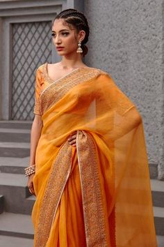 Shop for Jigar Mali Orange Chiniya Silk Embroidered Saree With Blouse for Women Online at Aza Fashions Festive Orange Pre-draped Saree, Orange Choli With Sheer Dupatta For Festivals, Orange Chanderi Choli With Gota Work, Chanderi Orange Choli With Gota Work, Orange Saree Choli With Resham Embroidery, Elegant Orange Choli With Zari Work, Elegant Orange Choli With Resham Embroidery, Elegant Orange Choli For Diwali, Elegant Orange Choli With Dupatta