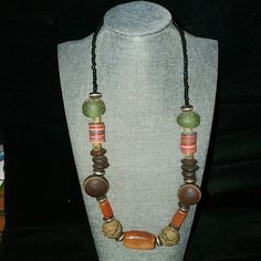 Necklace From The Mother Land. All Materials Are Organic And Handmade. Brown Jewelry With Colorful Beads, Brown Single Strand Beaded Necklace, Beaded Brown Necklaces, Brown Large Beads Long Necklace, Unique Brown Necklaces With Colorful Beads, Adjustable Brown Necklaces, Brown Long Necklace With Large Beads, Long Brown Necklace With Colorful Beads, Unique Brown Single Strand Jewelry