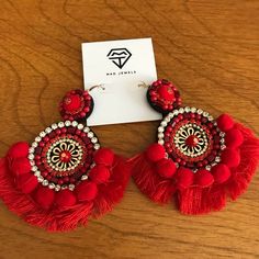 Look At These Beauties! Brand New In Package! Never Worn! Red Fringe Bohemian Earrings From Mad Jewels. Just A Little Too Big For Me, So My Loss Is Your Gain! They Are About 2.5”-3” In Diameter At The Widest Point. Hook Back Style. Accented With Rhinestones, Gold, And That Awesome Red Pom Pom And Fringe! Don’t Let These Get Away! Offers Welcome. Red Tassel Drop Earrings For Pierced Ears, Red Dangle Tassel Earrings With Latkans, Red Beaded Drop Earrings With Latkans, Red Drop Earrings With Latkans, Red Beaded Earrings With Latkans For Gift, Red Drop Tassel Earrings For Summer, Red Tassel Drop Earrings For Summer, Red Beaded Earrings For Festive Occasion, Festive Red Beaded Earrings For Pierced Ears