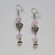 "Handmade Beaded Earrings ✿ Made with glass beads and metal accents ✿ Silver, glossy pink, and matte pink ✿ The earrings are \" long Fish Hook Options ✿ The Titanium fish hook is hypoallergenic and ideal for sensitive skin ✿ The regular fish hook is made of nickel free metal, it is not hypoallergenic" Adjustable Heart Beads Dangle Earrings, Pink Metal Heart Earrings For Pierced Ears, Adjustable Dangle Heart Earrings With Ear Wire, Pink Hypoallergenic Dangle Crystal Earrings, Pink Heart Earrings For Pierced Ears, Nickel-free Pink Dangle Beaded Earrings, Pink Nickel-free Dangle Beaded Earrings, Nickel Free Pink Dangle Beaded Earrings, Adjustable Dangle Heart Earrings