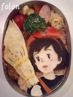 a child's plate with food in the shape of a woman holding a knife