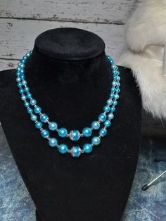 Formal Blue Single Strand Pearl Necklace, Blue Single Strand Pearl Necklace For Formal Occasions, Blue Double Strand Pearl Necklace For Gift, Blue Double Strand Pearl Necklace Gift, Blue Double Strand Necklaces For Party, Blue Double Strand Necklace For Party, Vintage Silver Double Strand Beaded Necklace, Vintage Blue Single Strand Jewelry, Blue Double Strand Beaded Pearl Necklace