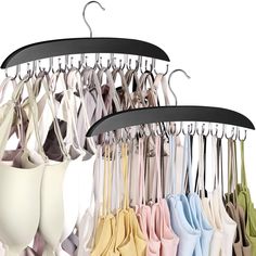 an assortment of clothes hanging on hangers in various colors and shapes, including pink, blue, yellow, green, white