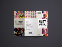 an open book with images of people and flowers on the cover, in front of a dark background