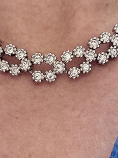 Gorgeous Rhinestone Necklace. Very well made. No marker marks. Silvertone.  No missing Rhinestones. Stones are all bright. Beautiful wedding necklace.  See photos for measurements.  Any questions or concerns please ask. I will most helpful.  Check out my other shops www.arlettemichelle.etsy.com  www.jmoriginalart.etsy.com  www.jmoriginalart.com Diamond White Rhinestone Necklace, Dazzling Diamond White Sparkling Rhinestone Necklace, Sparkling Cubic Zirconia Choker Necklace, Dazzling Rhinestone Necklace With Diamond Accents, Glamorous Crystal Diamond Necklace With Sparkling Stones, Dazzling Diamond Necklace With Rhinestones, Formal Sparkling Diamond Rhinestone Necklace, Formal Diamond Rhinestone Necklace, Sparkling Rhinestone Necklace For Anniversary