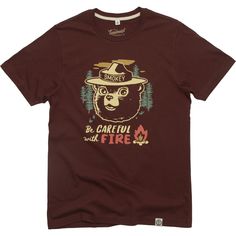 Celebrate your love for the outdoors with The Landmark Project Be Careful With Fire T-shirt  featuring the expert on fire safety himself  Smokey Bear. Red Short Sleeve T-shirt For Outdoor, Casual Red T-shirt For Outdoor Activities, Red Cotton Tops For Outdoor Activities, Red Short Sleeve T-shirt For Outdoors, Red Crew Neck Top For Outdoor Activities, Red Cotton Tops For Outdoor, Red Tops With Graphic Print For Outdoor, Red Graphic Print Top For Outdoor, Smokey Bear