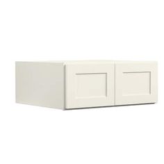 a white cabinet with two doors and one drawer