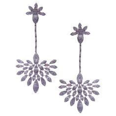 These symmetrical fan-shape dangling diamond earrings are crafted in 18-karat white gold, featuring 394 round white diamonds totaling of 3.32 carats and 170 baguette white diamonds totaling of 3.36 carats. Approximate total weight 28.29 grams. These earrings come with push back post backings. VS-G Quality natural white diamonds. Luxury Silver Bridal Earrings With Baguette Diamonds, Luxury Diamond Dangle Earrings, Silver Baguette Diamond Dangle Earrings, Silver Dangle Diamond Earrings With Baguette Diamonds, Dangling Diamond Earrings, American Diamond, Gems Jewelry, White Diamonds, White Diamond