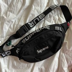 Bought From Stockx For $450 Just Never Wore It But Makes Any Fit Look Hard Asf Brand New Just Couldn’t Re Sell Bck To Stock X Bc The Original Tag Is Gone #Supreme #Fannypack #Bag #Shoulderbag Trendy Black Shoulder Bag For Streetwear, Black Tote Bag With Logo, Designer Black Bag With Large Capacity, Designer Black Bags With Large Capacity, Designer Black Bags Large Capacity, Black Rectangular Shoulder Bag With Logo, Modern Pouch Bag With Logo, Designer Crossbody Bag With Zipper Pocket, Black Tote Chest Bag For Daily Use