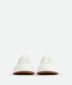 "Find BOTTEGA VENETA Vulcan Leather Sneaker on Editorialist. Leather lace-up sneaker. Lining: Cotton. Color: Optic White. Rubber outsole. Flatform: 3.5 cm | 1.4\". • Material: Calfskin." Designer Lace-up Sneakers With Vulcanized Sole, Luxury Vulcanized Lace-up Sneakers, Luxury Lace-up High-top Sneakers With Vulcanized Sole, Designer Lace-up Sneakers With Abzorb Midsole, Designer Low-top Sneakers With Vibram Sole, White Sole Lace-up Platform Sneakers With Vibram Sole, Jewelry Knots, Leather Denim, Fragrance Collection