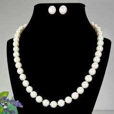 Description  Material  : Genuine Freshwater Pearl Length   : 17 Inches Shape      :  Round   Bead Size:  9.5mm-10mm Color       :  Natural White  Closure    : Pearl Clasp  This classic style is evergreen and can be worn on many party or everyday outfits. Try it out for yourself.  A Brand you can always Trust. PERFECT FOR GIFTING : These elegant pearls make the perfect gift for Mother's Day, Valentine's Day, Christmas, Hannukah, Birthdays, Engagement, Brides, Bridesmaids or Graduation for any wom Classic Jewelry Sets With Round Beads As A Gift, Classic Round Jewelry For Mother Of The Bride, Classic Pearl White Necklace For Mother Of The Bride, Classic White Pearl Necklace For Mother Of The Bride, Classic White Jewelry Sets For Wedding, Formal White Single Strand Bridal Necklace, Classic Pearl White Jewelry Sets, White Jewelry For Mother Of The Bride, Classic White Bridal Necklace For Mother Of The Bride