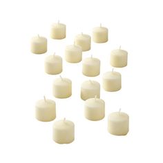 many white candles are arranged in the shape of a triangle on a white background,