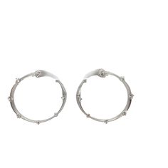 18kt white gold 1 1/4 inch open forward facing hoop earrings. These boldly elegant earrings are a true statement piece. Each earring features a stunning array of diamonds, adding a perfect touch of luxury to any outfit. The earrings feature 0.47ct total diamonds  Product: Earrings Material: 18kt White Gold Gemstone: Diamond  Gemstone Carat: 0.47ts Gemstone Shape: Round Button Earrings, Gold Pearl, Elegant Earrings, Diamond Gemstone, Statement Pieces, 4 Inch, Hoop Earrings, Diamonds, White Gold