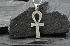 Ankh Cross Pendant made of Solid 925 Sterling Silver ☞ made to last.Matching Ring & Earrings - please ask meDetails:• Hammered Cross Pendant• Dimensions: Pendant Height 36mm, Width 17mm• Free Complimentary Chain• Solid 925 Sterling SilverSKU P-01302 Symbolic Nickel-free Jewelry For Anniversary, Spiritual Sterling Silver Pendant Jewelry, Pierced Sterling Silver Cross Jewelry, Silver Symbolic Jewelry For Anniversary, Symbolic Pendant Jewelry For Wedding, Silver Etched Pendant Jewelry, Spiritual Silver Etched Jewelry, Spiritual Sterling Silver Jewelry For Wedding, Etched Silver Pendant Jewelry