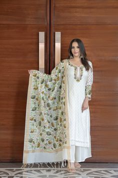 Step into the realm of sophistication with our Self Jacquard Cotton Kurta, Palazzo, and Dupatta set. The kurta features beautiful multi-color embroidery on the sleeves and neckline, while the all-over Aari embroidered dupatta adds a touch of traditional charm. Embrace comfort and elegance with this captivating ensemble for any occasion. Experience the Magic of Threads with Angad Creations 🧵✨ Embrace the Beauty of Kashmiri Embroidery, Intricate Motifs & Floral Patterns, Unveiling the Artistry of Embroidered Fashion - - - - - - - - - - - - - - - - - - - -  Product Details - Condition: Brand New (made to order) - Collection: Magic Of Threads - Style: Straight Kurta Palazzo & Dupatta set - Embroidery: Kashmiri Aari Work - Colour: White - Embroidery Colour: Multi-Colour - Care Instructions: Dr White Palazzo Set With Traditional Drape And Printed Motifs, Elegant White Anarkali Set With Printed Motifs, White Printed Motifs Palazzo Set For Festive Occasions, Festive White Palazzo Set With Printed Motifs, White Anarkali With Printed Motifs, White Traditional Wear With Printed Motifs For Navratri, White Lawn Suit With Printed Motifs For Navratri, White Salwar Kameez With Printed Motifs For Navratri, Traditional White Anarkali Set With Printed Motifs