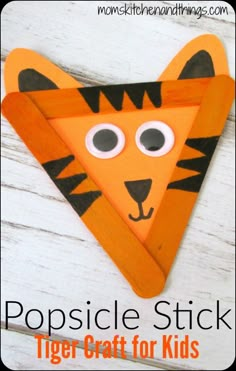 popsicle stick tiger craft for kids with text overlay that reads popsicle stick tiger craft for kids