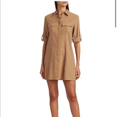 Utilitarian Shirtdress Finished With Classic Roiled Cuff. Spread Collar Short Sleeves Rolled Cuff Concealed Button Placket Linen/Elastane Dry Clean Imported Fall Daywear Shirt Dress With Cuffed Sleeves, Semi-formal Shirt Dress With Spread Collar And Button Cuffs, Formal Shirt Dress With Button Cuffs And Spread Collar, Formal Shirt Dress With Spread Collar And Button Cuffs, Elegant Shirt Dress With Cuffed Sleeves And Spread Collar, Elegant Collared Shirt Dress With Cuffed Sleeves, Daywear Shirt Dress With Cuffed Sleeves And Spread Collar, Cuffed Sleeves Shirt Dress With Spread Collar, Chic Workwear Shirt Dress With Roll-up Sleeves