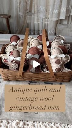 an antique quilt and vintage wool gingerbread men in a basket with the words antique quilt and vintage wool gingerbread men