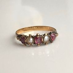 Antique 14K, Garnet & Pearl Ring - Etsy Heirloom Multi-stone Pearl Ring As Gift, Heirloom Multi-stone Pearl Ring Gift, Victorian Multi-stone Ruby Ring For Anniversary, Victorian Multi-stone Ruby Ring Gift, Vintage Multi-stone Ruby Ring Gift, Vintage Multi-stone Ruby Ring For Gift, Pearl Ring, Statement Rings, Garnet