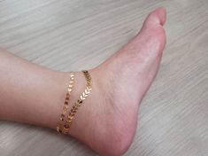 "Chevron Arrow Anklet * Sequin Chain Anklet * boho anklets for women * Anklet Bracelet * 18k gold Chain Anklet * delicate Anklet -------------------------------------------------- Chain: 8.5-10.5\" adjustable -------------------------------------------------- ♥ Gold Plated ------------------------------------------------- Check out bracelet version for here! https://www.etsy.com/listing/619623114/18k-gold-45mm-wide-thinck-chain-bracelet?ref=shop_home_active_1" Trendy Gold Anklets For Festivals, Trendy Gold Ankle Wrap Anklets, Minimalist Gold Bracelet For Festivals, Gold Ankle Wrap Bracelets For Festivals, Handmade Gold Ankle Wrap Jewelry, Handmade Trendy Gold Anklets, Trendy Handmade Gold Anklets, Handmade Gold Anklets For Summer, Trendy Gold Anklet As Gift