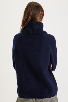 Take a walk on the cozy side all season long in the Lulus Found the Warmth Navy Blue Turtleneck Pullover Sweater! Soft and stretchy sweater knit shapes this closet-essential sweater that has a chic turtleneck, long raglan-style sleeves, and a relaxed, wide-cut bodice. Contrasting ribbed knit accents the neckline, cuffs, and hem. Fit: This garment fits true to size. Length: Size medium measures 23" from shoulder to hem. Bust: Great for any cup size. Waist: Not Fitted - comfortable room throughout Casual Cowl Neck Sweater For Layering, Soft Knit Turtleneck For Layering, Versatile Funnel Neck Winter Sweater, Relaxed Fit Knit Sweater With Funnel Neck, Versatile Winter Sweater With Funnel Neck, Relaxed Fit Soft Knit Turtleneck Sweater, Soft Knit Turtleneck Sweater With Relaxed Fit, Versatile Fine Knit Turtleneck Sweater, Relaxed Fit Knit Turtleneck Sweater