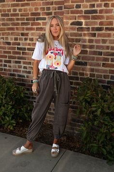 A true comfy boho classic is the True To You Jogger Pant - they're a showstopper! Get ready for the ultimate comfort and so many compliments while wearing these because they feature: So cozy, mineral - washed fabric Loose and slouchy jogger pant silhouette High - rise elastic drawstring waistband Exposed seams throughout for added boho style Convenient side pockets and patch pockets along the legs and backside Cute gathered elastic ankle closures Your new favorite comfy boho outfit pair with: He Cotton Harem Pants For Fall Loungewear, Cotton Harem Pants For Loungewear In Fall, Fall Cargo Lounge Pants, Fall Loungewear Cargo Pants, Relaxed Fit Cargo Pants For Fall Loungewear, Washed Bottoms For Loungewear In Fall, Fall Washed Bottoms For Loungewear, Casual Soft-washed Bottoms For Fall, Hippie Relaxed Fit Harem Pants For Loungewear