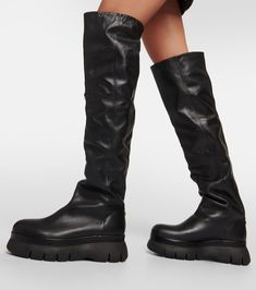 Find ISABEL MARANT Malyx Leather Over-the-knee Boots on Editorialist. Upper: calf leather. Lining: calf leather. Sole: leather insole, rubber sole. Toe shape: round toe. Made in Portugal. Designer color name: Black/Black. Comes with a box. Comes with dust bag. Leather Over-the-knee Platform Boots For Fall, Edgy Wide Calf Leather Knee-high Boots, Edgy Leather Knee-high Boots With Wide Calf, Leather Knee-high Boots For Winter, Leather Knee-high Winter Boots, Black Leather Over-the-knee Platform Boots, Edgy Leather Thigh-high Platform Boots, Edgy Leather Thigh High Platform Boots, Trendy Knee-high Leather Boots