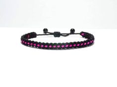 Black braided bracelet with a pink line, this bracelet is adjustable to fit wrist sizes from 6 to 9 inches, with an easy to use zip like function to fit your wrist, you'll have it on as soon as you get it. Made from high quality string, it will be sure to last. Each bracelet is carefully handcrafted and give proper time to ensure quality. Fast and Free shipping Zip Code Gifts, Braided Bracelet, Black Braids, You Get It, Braided Bracelets, Embroidered Friendship Bracelet, Jewelry Bracelets, Braids, Bracelet