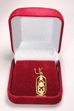 "Egyptian Hand Crafted 18K Yellow Gold Charming Cartouche Scarab Pendant 1.7 Gr Weight Approximate : 1.7 Gr Height : 1.4\"= 36 mm Width : 0.43\" = 11 mm ✔ IT IS Tested & SIGNED WITH THE EGYPTIAN Gold Government HALLMARK FOR 18K GOLD to Ensure Authenticity. ✔ Lovely gift idea ABSOLUTELY GORGEOUS, LOOKS FABULOUS ON. ✔ 100% Egyptian handmade. ✔ Condition: A brand-new, exactly as on the photos. ★ GIFTS ✔ All items are packaged in a paper jewelry gift box, ready for gifting. ✔ If you are sending Antique 22k Gold Pendant Jewelry, Gold Oval Temple Jewelry, Traditional Yellow Gold Oval Pendant Jewelry, Temple Jewelry Oval Jewelry Gift, Temple Jewelry Gift With Oval Shape, Oval Temple Jewelry As A Gift, Oval Temple Jewelry For Gifts, Antique Gold Ankh Jewelry, Antique Ankh Jewelry As Gift