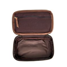 The 6666 leather travel case is crafted from full grain leather and features the 6666 brand stamped on the top. Genuine full grain leather Stamped 6666 brand Leather handle Zip around top closure 1 spacious main compartment 1 interior mesh zip closure pocket 10” W x 6” L x 3.5” D Imported Rectangular Travel Cases With Zipper Closure, Rectangular Travel Case With Zipper Closure, Brown Pouch With Zipper Closure For Travel, Brown Zipper Closure Cases For Everyday Use, Brown Cases With Zipper Closure For Everyday Use, Leather Rectangular Pouch With Zipper, Leather Pouch With Zipper Closure Rectangular Case, Leather Rectangular Pouch With Zipper Closure, Leather Cases With Zipper Closure For Everyday Use