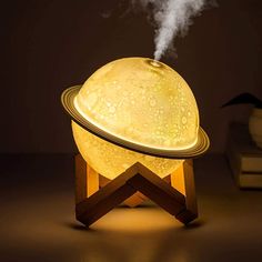 PRICES MAY VARY. 🌛 Two in One Moon Lamp Humidifier --- The 3D moon lamp can be used as a personal humidifier, moisturizer, air purifier, diffuser for soothing aromatherapy lamp design makes your humidifier stylish and different from others. 3 color night lights can provide a comfortable sleeping environment for you. Give you and your baby a complete moonlight 🌛 Unique Humidification Function --- The water tank capacity approximately 200ml. Advanced ultrasonic technology can prevent the skin fr Moon Night Light, Aromatherapy Humidifier, Decorative Night Lights, Humidifiers, Moon Night, Air Humidifier, Aromatherapy Diffusers, Aroma Diffuser, Night Lamps