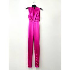 Envelop yourself in the luxury of this Deep V Satin Jumpsuit!Sporty and sexy, it's perfect for a night out, special occasion, or just a club.Available in a dazzling array of colors - Black, Sky Blue, Royal Blue, Silver, White, Orange, and Fuchsia - with solid patterning, discover your slim fit style!Fitted with a Deep V-Neck, sleeveless, and crafted with stretch material that won't sheer, this piece is comfy and chic for every season. Pink Stretch Jumpsuits And Rompers For Evening, Fitted Satin Jumpsuit And Romper For Party, Glamorous Pink V-neck Jumpsuits And Rompers, Fitted Satin Jumpsuits And Rompers For Date Night, Elegant Pink Stretch Jumpsuits And Rompers, Glamorous Pink Jumpsuits And Rompers For Party Season, Pink Fitted Jumpsuit For Party, Glamorous Pink Jumpsuits For Party Season, Glamorous Pink Sleeveless Jumpsuits And Rompers