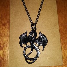 Dragon Necklace Black Dragon Charm 18 Inch Length Chain Handmade With Love Same Day Or Next Day Shipping! Feel Free Ask For Any Measurements Or Any Questions You Might Have Shopsaritalynne Black Metal Pendant Chain Necklace, Black Metal Chain Necklace As Gift, Black Metal Chain Necklace For Gift, Gift Black Metal Chain Necklace, Black Gothic Necklace With Chain, Handmade Black Metal Necklace, Black Gothic Chain Necklace Gift, Performance Outfits, Beaded Bib Necklace