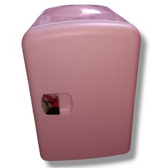 a close up of a pink refrigerator on a white background