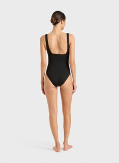 Margot one piece in black is a timeless classic swimsuit that has an elegant and flattering square neckline front and back. Self-lined in our ultra-soft Embodee™ fabric with high shaping power, Margot is like the little-black dress of swimsuits. It will be a core part of your swim wardrobe for years to come. Luxury fabric sustainably made in Italy.Garment sustainably and ethically made in Australia. Elegant Black Swimwear For The Pool, Chic Black Swimwear With Moderate Back Coverage, Black Second-skin Scoop Neck Swimwear, Black Second-skin Swimwear With Scoop Neck, Sleek Scoop Neck Swimwear For Poolside, Chic Black Smoothing Swimwear, Black Scoop Neck Bodysuit For Pool, Classic Black Lined Swimwear, Black Smoothing Scoop Neck Swimwear