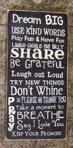 a black and white sign that says dream big use kind words to play fair & have fun share great laugh laugh laugh laugh