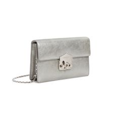 Flash Wallet clutch in silver metallic calfskin with mat gold removable chain. Details : Snap closure Mat Gold accessories6 cc compartment Internal pocket Measurements : 18x12x4 cm Made in Italy Luxury Classic Silver Wallet, Luxury Silver Rectangular Wallet, Luxury Silver Leather Wallet, Luxury Wallets With Silver-tone Hardware For Formal Occasions, Luxury Formal Wallets With Silver-tone Hardware, Silver Wallet, Crocodile Leather, Shopper Bag, Perfume Collection