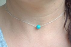 single turquoise bead necklace, sterling silver dainty necklace, tiny gemstone necklace Tiny turquoise bead necklace. Materials: - natural blue turquoise bead - 8 mm . - sterling silver delicate chain - silver components - because I use natural materials, they bead may vary in shape, size and color. Gift boxed. Link to my shop https://www.etsy.com/shop/SilverIrisJewelry?ref=hdr *INTERNATIONAL VAT TAXES & CUSTOMS FEE'S may be charged by your country's customs and/or postal system in order for Turquoise Sterling Silver Jewelry With Tiny Beads, Sterling Silver Blue Jewelry With Tiny Beads, Blue Sterling Silver Jewelry With Tiny Beads, Blue Sterling Silver Necklaces With Tiny Beads, Dainty Turquoise Single Strand Jewelry, Dainty Turquoise Necklace With Tiny Beads, Minimalist Sterling Silver Necklace With Tiny Beads, Dainty Turquoise Sterling Silver Necklace, Minimalist Single Strand Blue Jewelry