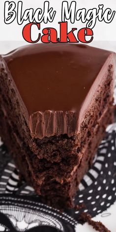 a slice of chocolate magic cake on a white plate with the words, black magic cake