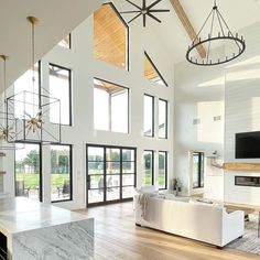 a large open living room with high ceilings