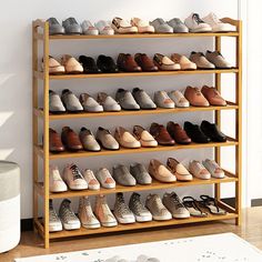 there are many pairs of shoes on the shelf