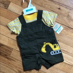 Two Piece Construction Theme Baby Boy Outfit Yellow And Gray Striped Shirt Olive Jumper With Construction Vehicle Carter’s Everyday Easy 3 Mos 8-12.5 Lbs 21.5-24 Ins Brand New With Tags/Never Worn Set Construction, Outfit Yellow, Grey Striped Shirt, Construction Vehicle, Construction Theme, Baby Fits, Boy Clothes, Baby Sets, Grey Stripes