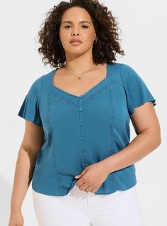 FIT Model is 5'10” wearing size 1. Measures 30” from shoulder (size 2). MATERIALS + CARE Washable Gauze woven fabric: The lightweight, breathably soft fabric you love is, at last, wash, wear and go! . Stretch level: None. 74% rayon, 26% polyester. Machine wash cold. Tumble dry low. Imported. DETAILS Low relaxed neck. Flutter sleeves. . Button front. . The best plus size women's Gauze Button Front Flutter Sleeve Top Tops in bluesteel made of washgauze. Flutter Sleeve Top, At Last, Flutter Sleeves, Fashion Tops, Flutter Sleeve, Soft Fabric, Woven Fabric, Soft Fabrics, Short Sleeves Tops