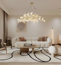 a modern living room with white furniture and large chandelier hanging from the ceiling