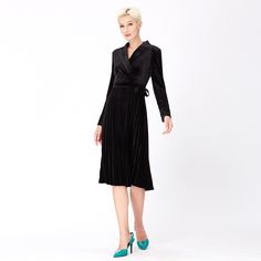 A very flattering silhouette with cut to fit bodice, tailor structure and wrap effect. The waist is fitted with a belt to be tied and the skirt features flared sun pleats that elegantly open the volume. A timeless line to wear all fall and winter. Suitable for an office outfit or to go out at the restaurant. Main fabric: 100% polyester Lining: 100% polyester Washing temperature 30° maximum in delicate cycle Low ironing temperature / bleaching prohibited Do not drum dry At The Restaurant, Velvet Wrap Dress, Size 10 Models, Office Outfit, Versatile Outfits, The Restaurant, Black Wrap Dress, Mens Jewelry Bracelet, Office Outfits