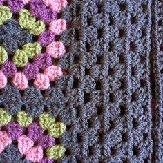 two crocheted squares that are on top of each other, one is purple and the other is green