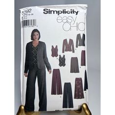 a woman's jacket and pants sewing pattern on a mannequin display stand