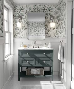 a white bathroom with floral wallpaper and mirror