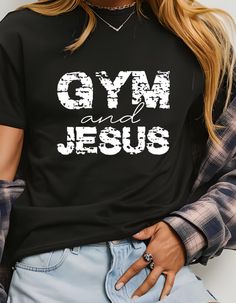 Show your passion for fitness and faith with this bold graphic tee featuring 'Gym & Jesus' in a stylish design. Perfect for workouts, casual wear, or expressing your devotion, this soft, comfortable t-shirt is a great conversation starter and a unique addition to your wardrobe. Stay motivated, both physically and spiritually Relaxed Fit Gym T-shirt With Text Print, Athleisure Slogan T-shirt For Workout, Athleisure Gym Tops With Sublimation Print, Comfortable Gym T-shirt With Letter Print, Slogan T-shirt For Workout Athleisure, Athleisure Slogan Workout T-shirt, Workout Graphic Tee With Letter Print, Graphic Tee With Letter Print For Workout, Athletic Fit Athleisure T-shirt With Letter Print